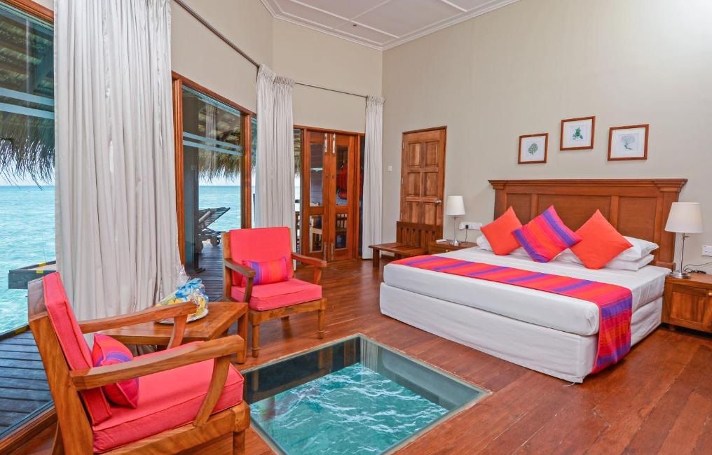 Adaaran Club Rannalhi Water Villa Bedroom