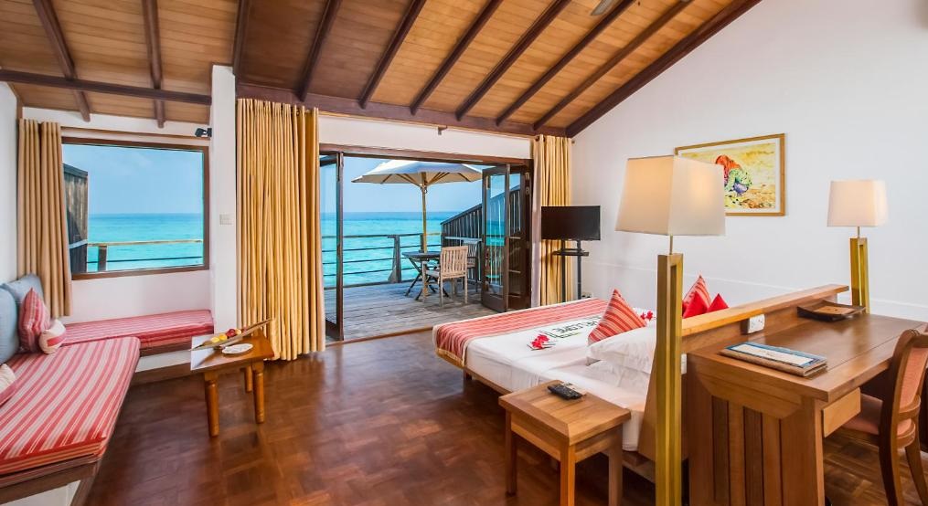Reethi Beach Resort Water Villa Bedroom